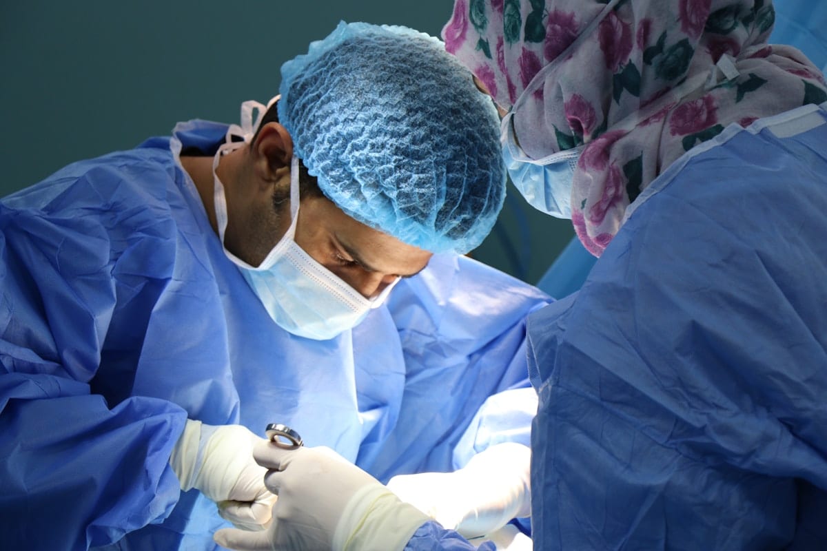 Emergency care team working under clinical lighting, reflecting the urgent response snake bite envenomation requires