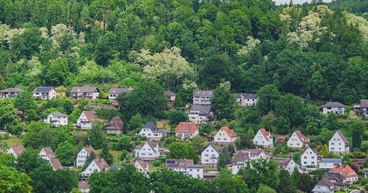 Hillside neighborhood surrounded by trees, representing the residential character of North Richland Hills, TX